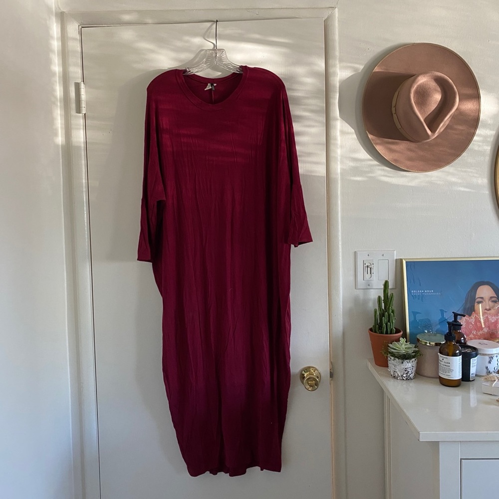 Long red midi dress, tighter around the calves!